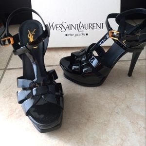 Yves Saint Laurent shoes, color Nero, has heel tap replacements, only worn once